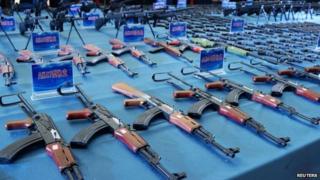 This picture taken on 1 April 2014 shows guns confiscated by police in Guiyang, southwest China's Guizhou province