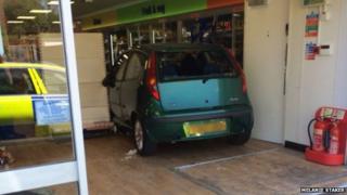 The car inside the Co-op shop
