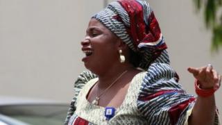 A woman react at Asokoro hospital morgue after she lost a relative following an explosion at a bus park in Abuja, Nigeria, Tuesday 15 April 2014
