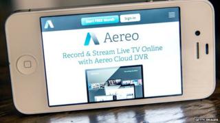 A smartphone displays the Aereo app.