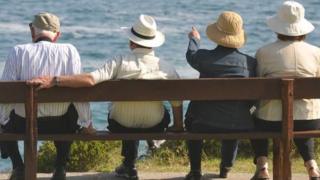 Pensioners sitting on a bench