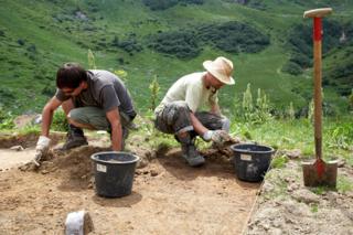 Archaeologists digging on a site in Germany