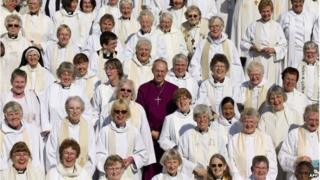 Justin Welby with a large number of female priests