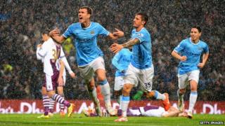 Manchester City players celebrating