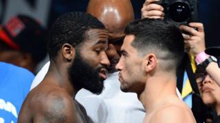 Boxers Adrien Broner and Carlos Molina face each other during their pre-match weigh-in on 2 May, 2014.