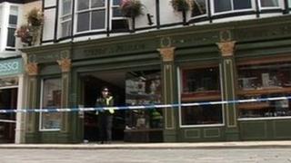 Police officer outside of jewellers