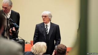 Bernie Ecclestone arrives for the third day of his trial for bribery on 9 May 2014