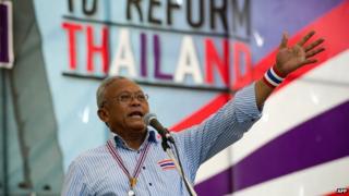 Anti-government protest leader Suthep Thaugsuban delivers a speech during a rally at Government House in Bangkok on 11 May 2014