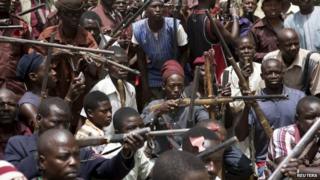 A vigilante group of traditional hunters in a camp in Maiduguri, Nigeria - 21 May 2014