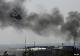 A Ukrainian helicopters gunship fires at pro-Russia gunmen at Donetsk airport - 26 May 2014