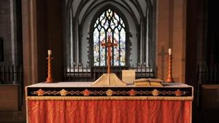 Cross on altar