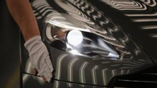 Aston Martin Vanquish inspected by hand