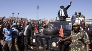 Malawi's new President Peter Mutharika waves at people at the Kamuzu stadium in Blantyre on 2 June 2014