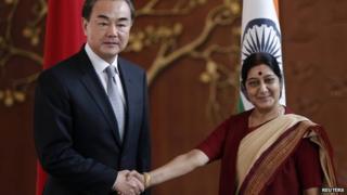 Chinese foreign minister Wang Yi (left) met his counterpart Sushma Swaraj on Sunday
