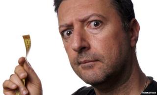 Man holding a tape measure