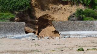 Breach in the Fermain Bay sea defences caused by storms in January