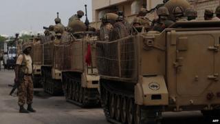 Pakistani troops after attack on Karachi airport. 9 June 2014