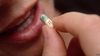 Woman taking antidepressant medication