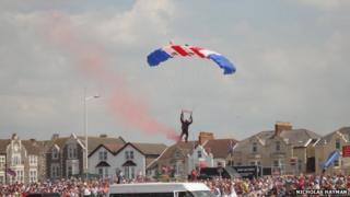 The parachutist just before impact