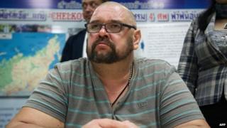Alexander Matusov is presented to the media during a press conference at Thailand's immigration offices in Bangkok, 25 June 2014
