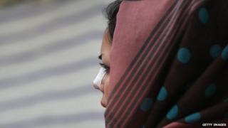Iranian woman after cosmetic surgery