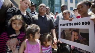 Parents of 19-month-old Bounkham Phonesavanh attend vigil
