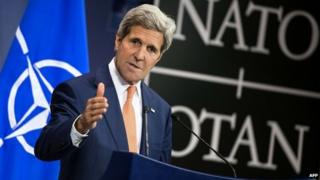 US Secretary of State John Kerry speaks during a press conference at NATO headquarters - 25 June 2014