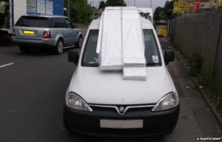 The Vauxhall Combo van with its windscreen obscured