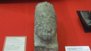 Stone carving, believed to represent the White Lady of Oystermouth