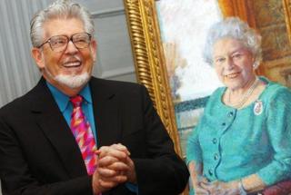 Rolf Harris with his portrait