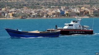 The boat carrying bodies