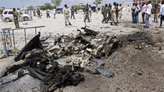 Wreckage of suicide car bomb in Mogadishu (5 July)
