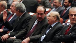 Iraqi Prime Minister Nuri al-Maliki (centre) at the first session of parliament on 1 July