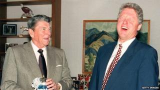 Ronald Reagan presents Bill Clinton with a jar of jelly beans in 1992.