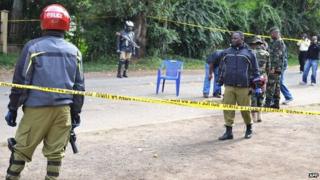 Police cordon off the site of a bomb attack on July 8, 2014 in Arusha, nothern Tanzania, that injured eight people late the night before.