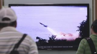 People in South Korea watch on TV a missile launch in North Korea. Photo: 29 June 2014