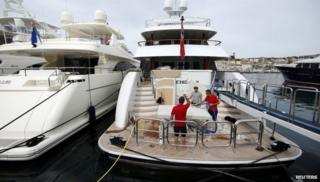 Yachts moored in a marina