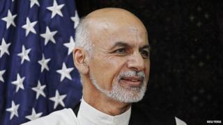 Afghan presidential candidate Ashraf Ghani Ahmadzai meets with U.S. Secretary of State John Kerry meets with at the U.S. Embassy in Kabul, Friday, July 11