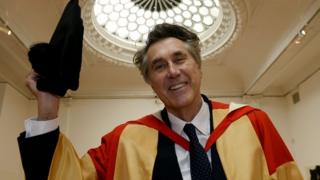 Bryan Ferry wearing his cap and gown