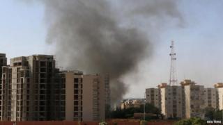 Smoke rises above Tripoli (13 July 2014)
