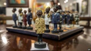A chessboard, showing South Africa's politicians, including late President Nelson Mandela (C) as the the king figurine