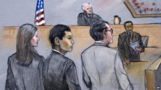 In this courtroom sketch, Azamat Tazhayakov (centre) appeared in a Boston, Massachusetts, courtroom on 21 July 2014