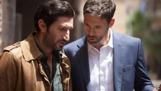Fares Fares and Adam Rayner in an episode of Tyrant