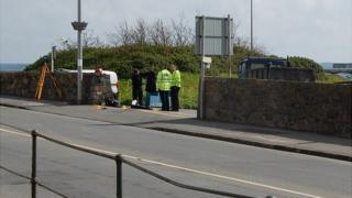 Police at the scene of the collision