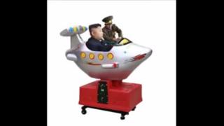 A screengrab from the "Fat guy Number 3" video showing Kim Jong-un in a small fairground airplane