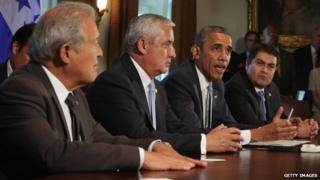 US President Barack Obama (second from right) appeared with President Otto Perez Molina (second from left) of Guatemala, President Juan Orlando Hernandez (right) of Honduras, and President Salvador Sanchez Ceren (left) of El Salvador at the White House in Washington on 25 July 2014