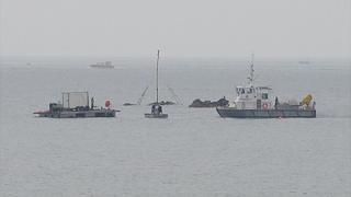 Divers inspecting the seabed near the long sea outfall off Guernsey's Belle Greve Bay