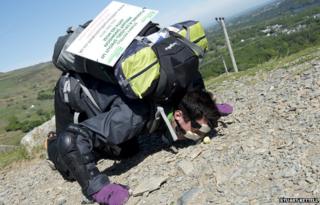 Stuart Kettell pushing a sprout up a hill