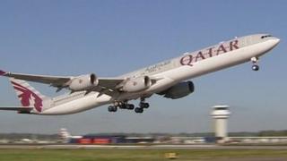 Library image of Qatar Airways plane