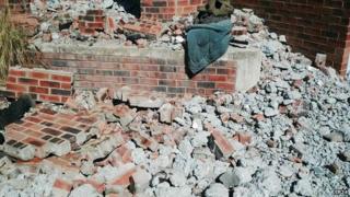 The wall that collapsed killing a man near Orkney in South Africa after an earthquake on Tuesday 5 August 2014
